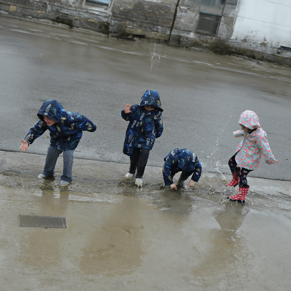 kids play in rain